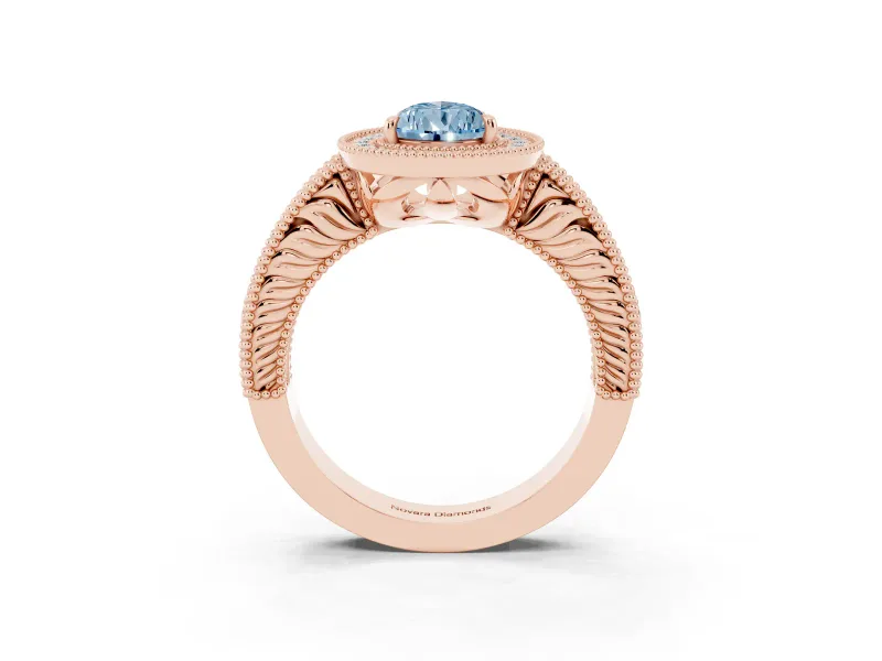 Fancy Blue Pear Cut Diamond Halo Ring Set in Rose gold with Round Accent Halo, Pavé Band and Prong Setting