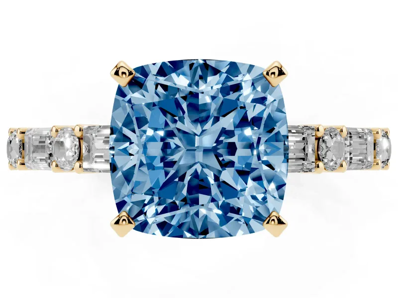Fancy Blue Cushion Cut Diamond Solitaire Set in Yellow gold with Side Baguettes and Channel Set Band