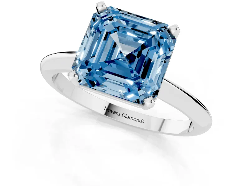 Fancy Blue Asscher Cut Diamond Solitaire Ring Set in White gold with Prong Setting on a Plain Round Band