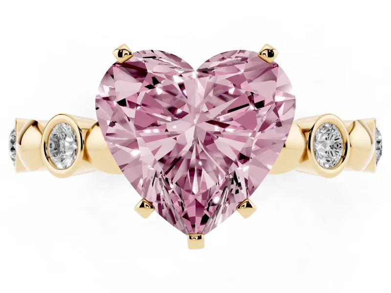 Fancy Pink Heart Cut Diamond Solitaire Ring Set in Yellow gold with Bezel-Set Accents on Beaded Band and Prong Setting
