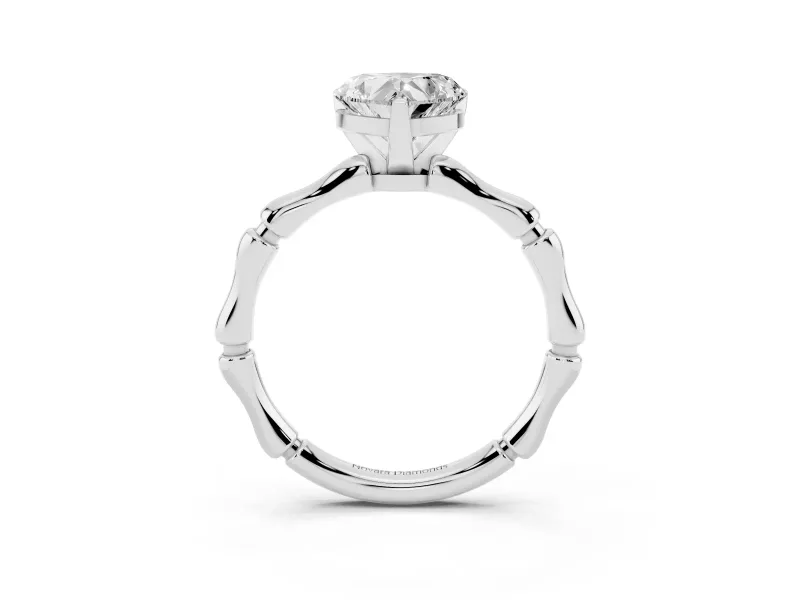 Heart Cut Diamond Solitaire Ring Set in Silver with Bamboo Band and Prong Setting