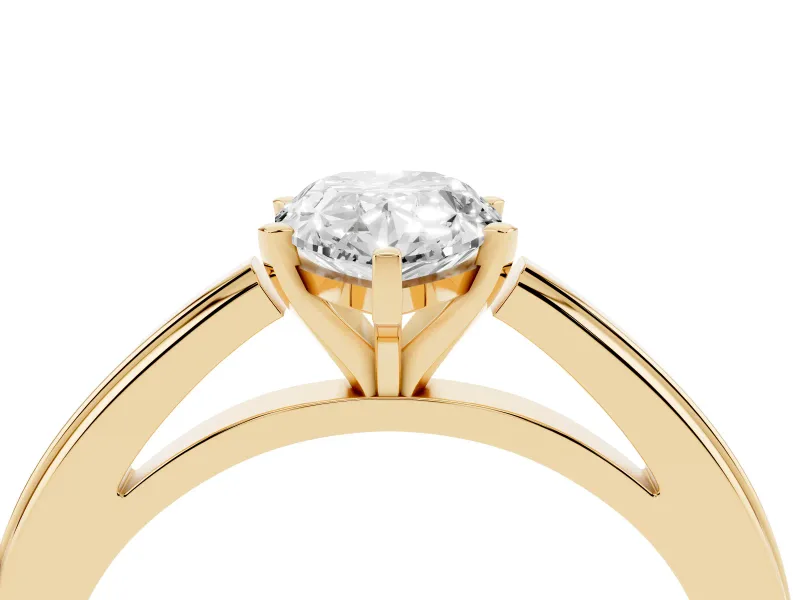 Pear Cut Diamond Solitaire Ring Set in Yellow gold with Prong Setting and Classic Band