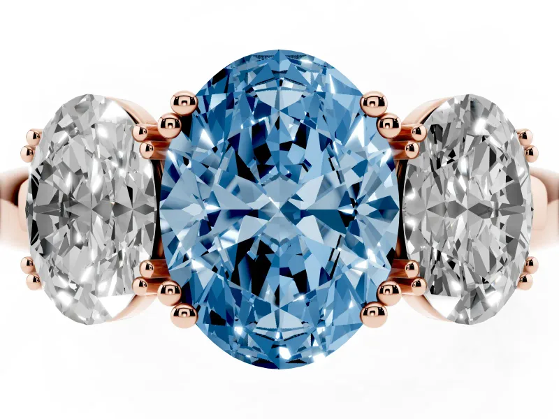 Fancy Blue Oval Cut Diamond Three-Stone Ring Set in Rose gold with Polished Band and Prong Setting