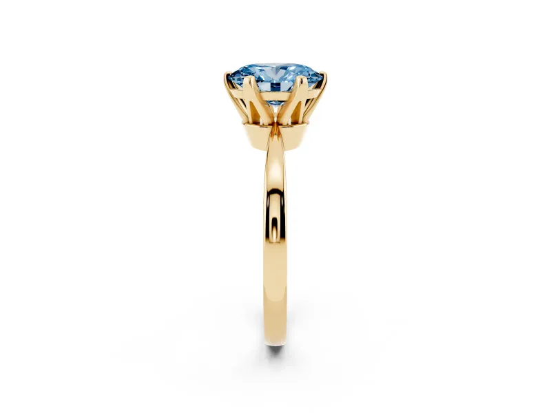 Fancy Blue Oval Cut Diamond Solitaire Engagement Ring Set in Yellow gold with Slim Tapered Solitaire Band