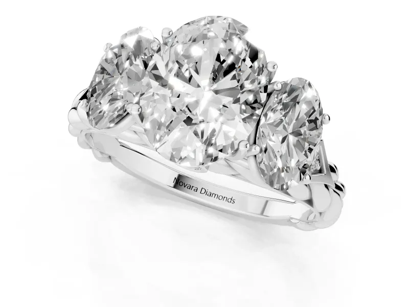 Oval Cut Diamond Three-Stone Ring Set in White gold with Braided Band