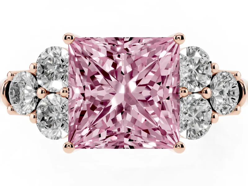 Fancy Pink Princess Cut Diamond Cluster Ring Set in Rose gold with Round Accent Stones and Prong Setting on a Plain Band