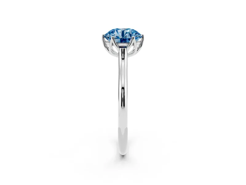 Fancy Blue Round Cut Diamond Solitaire Cathedral Ring Set in White gold with Prong Setting