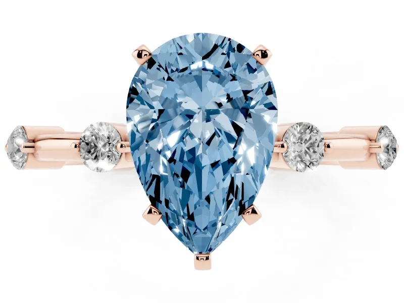 Fancy Blue Pear Cut Diamond Solitaire Ring Set in Rose gold with Bezel Set Side Stones and Prong Setting