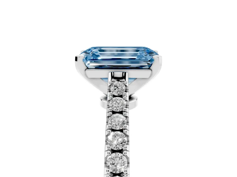 Fancy Blue Emerald Cut Diamond Solitaire Engagement Ring Set in Silver with Delicate Pavé Band and Prong Setting