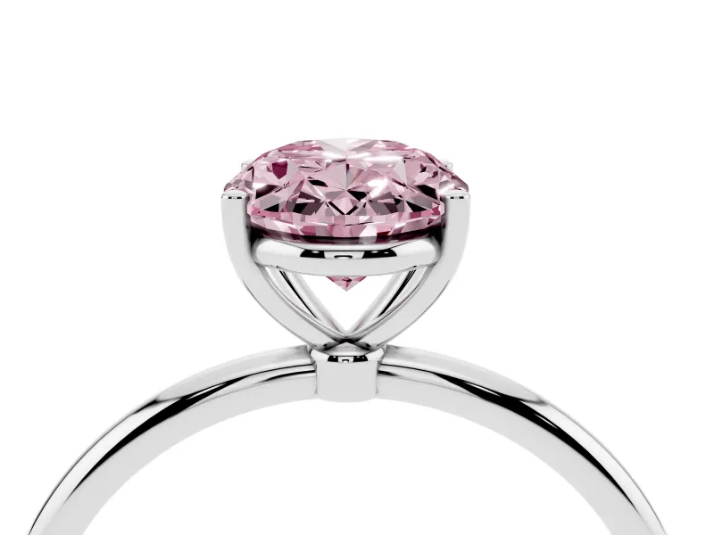 Fancy Pink Oval Cut Diamond Solitaire Engagement Ring Set in Platinum with Thin Band and Prong Setting