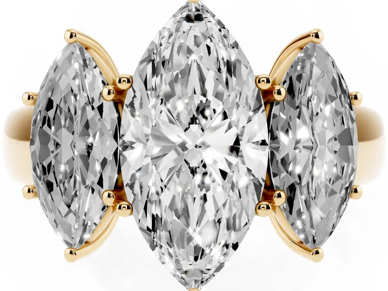 Three-Stone Marquise Cut Diamond Ring Set in Yellow gold with Matching Prong Settings and Plain Band