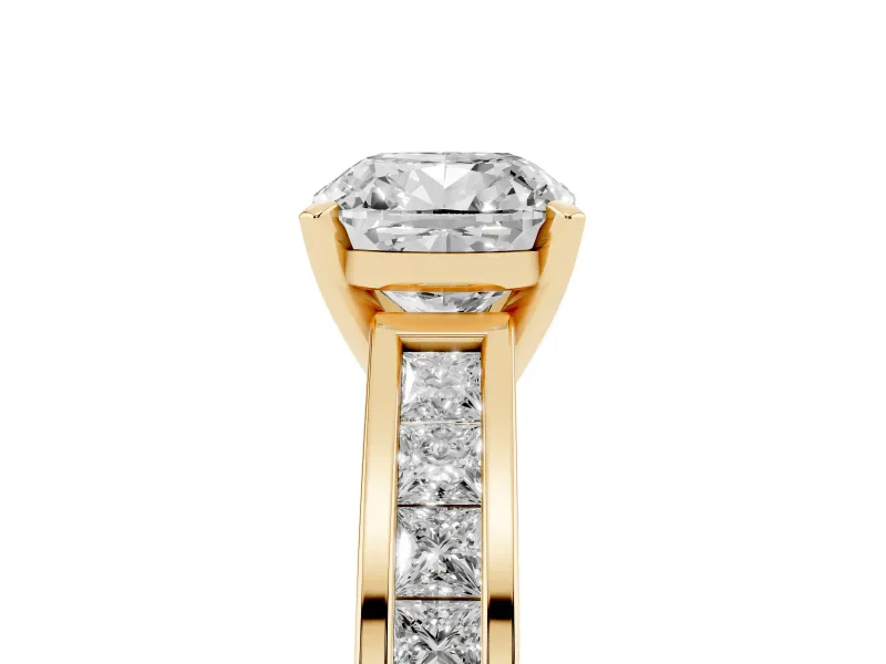 Cushion Cut Diamond Solitaire Ring Set in Yellow gold with Channel-Set Band and Prong Setting