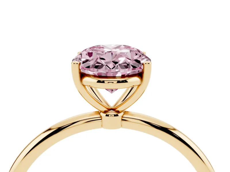 Fancy Pink Oval Cut Diamond Solitaire Engagement Ring Set in Yellow gold with Thin Band and Prong Setting