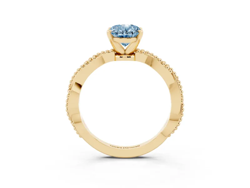 Fancy Blue Oval Cut Diamond Solitaire Ring Set in Yellow gold with Twisted Band and Bead Prong Setting