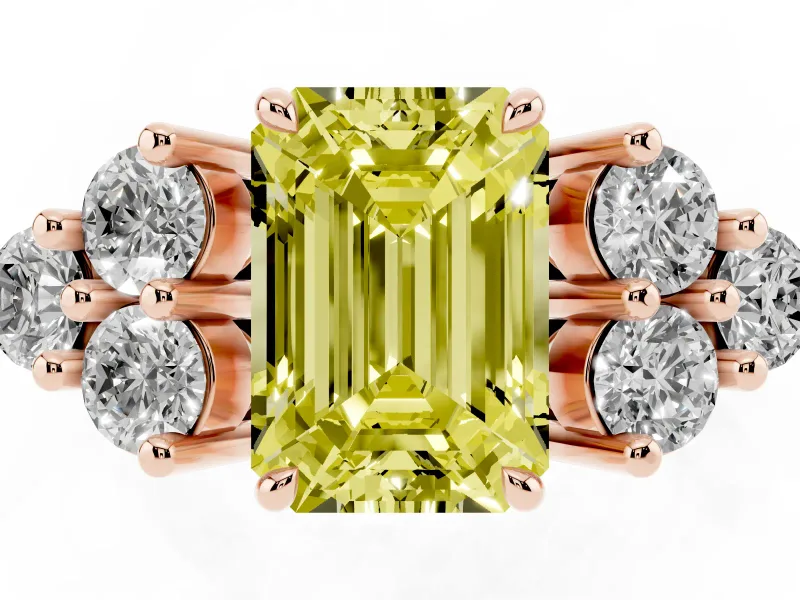 Fancy Yellow Emerald Cut Diamond Solitaire Ring Set in Rose gold with Cluster Accents on Each Side