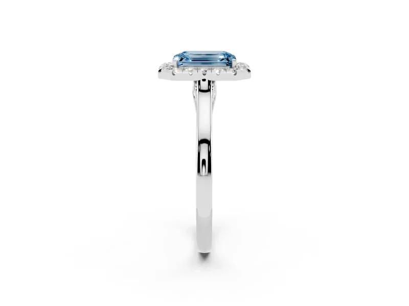 Fancy Blue Emerald Cut Halo Round Diamond Solitaire Ring Set in Silver with Pavé Band and Prong Setting