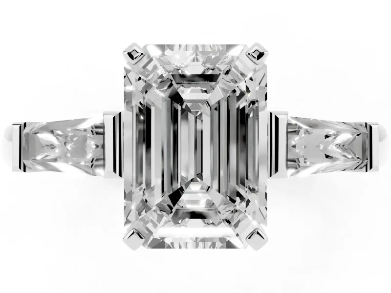Emerald Cut Diamond Solitaire Ring Set in Platinum with Tapered Baguette Side Stones and Prong Setting