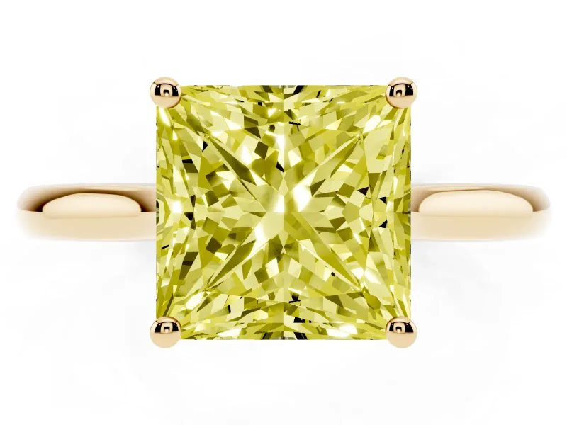 Fancy Yellow Princess Cut Diamond Solitaire Ring Set in Yellow gold with Cathedral Band and Prong Setting