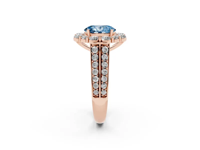 Fancy Blue Oval Cut Diamond Halo Engagement Ring Set in Rose gold with Split Shank and Prong Setting