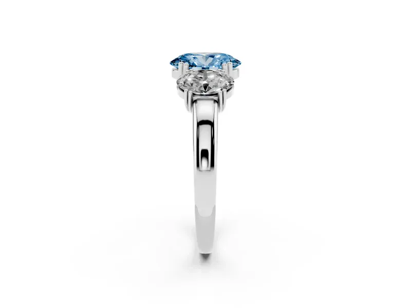 Fancy Blue Oval Cut Diamond Three-Stone Ring Set in Silver with Polished Band and Prong Setting