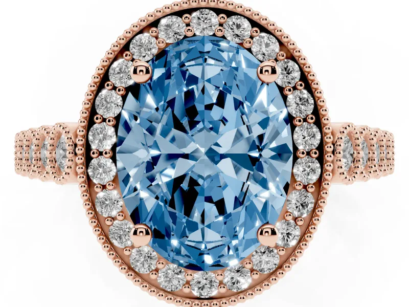Fancy Blue Oval Cut Diamond Milgrain Halo Solitaire Ring Set in Rose gold with Bezel Set Side Stones and Pavé Band