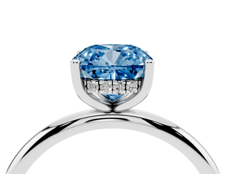 Fancy Blue Cushion Cut Diamond Solitaire Engagement Ring Set in White gold with Prong Setting and Polished Band