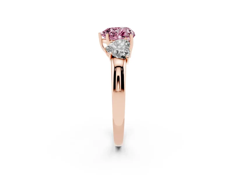 Fancy Pink Heart Cut Diamond Three-Stone Ring Set in Rose gold with Bold Center and Classic Band