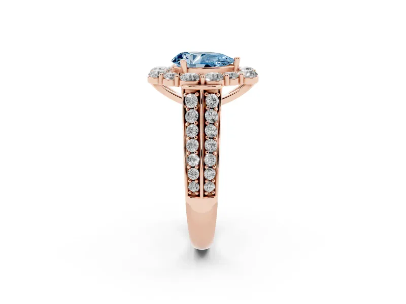 Fancy Blue Pear Cut Diamond Halo Engagement Ring Set in Rose gold with Split Shank and Prong Setting