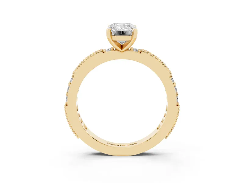 Emerald Cut Diamond Solitaire Ring Set in Yellow gold with Slim Pavé Band and Prong Setting