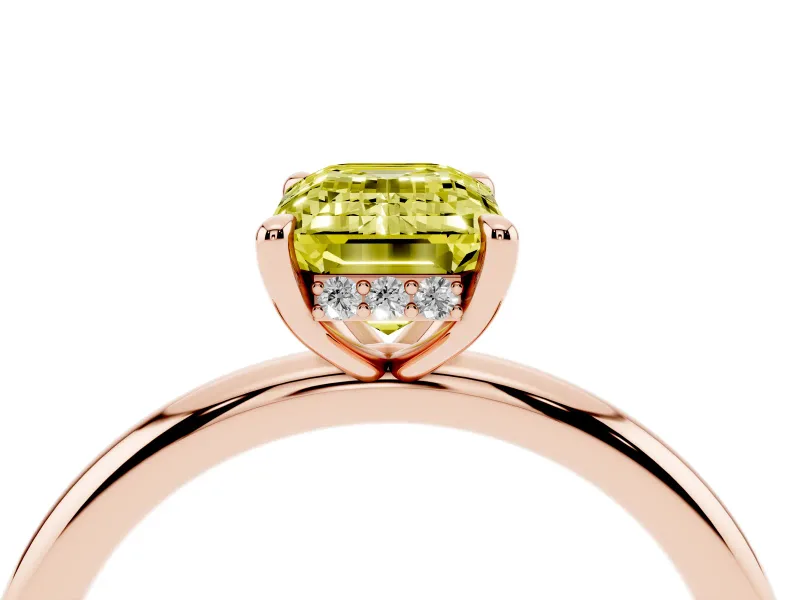 Fancy Yellow Emerald Cut Diamond Solitaire Ring Set in Rose gold with Thin Band and Prong Setting