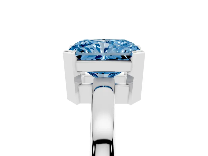 Fancy Blue Radiant Cut Diamond Solitaire Ring Set in Silver with Prong Head and Smooth Polished Band