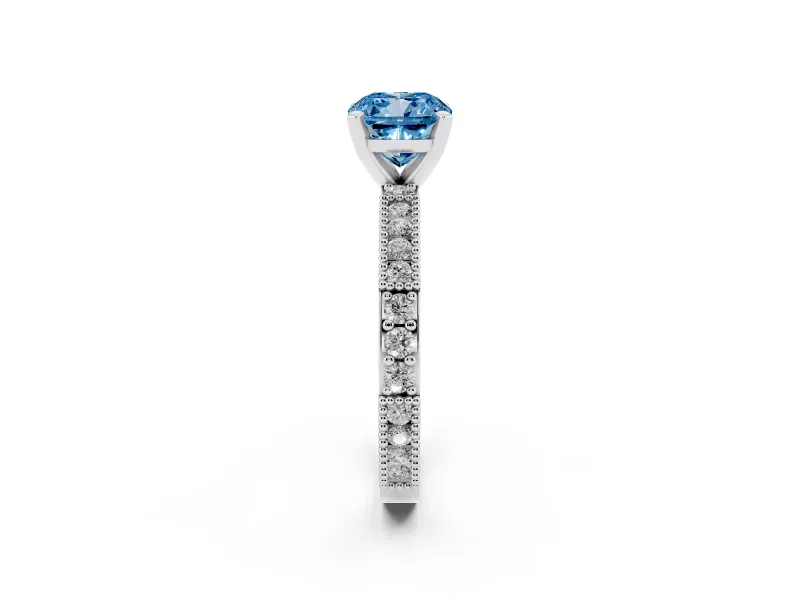 Fancy Blue Cushion Cut Diamond Solitaire Ring Set in White gold with Slim Pavé Band and Prong Setting
