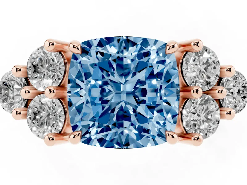 Fancy Blue Cushion Cut Diamond Solitaire Ring Set in Rose gold with Cluster Accents on Each Side