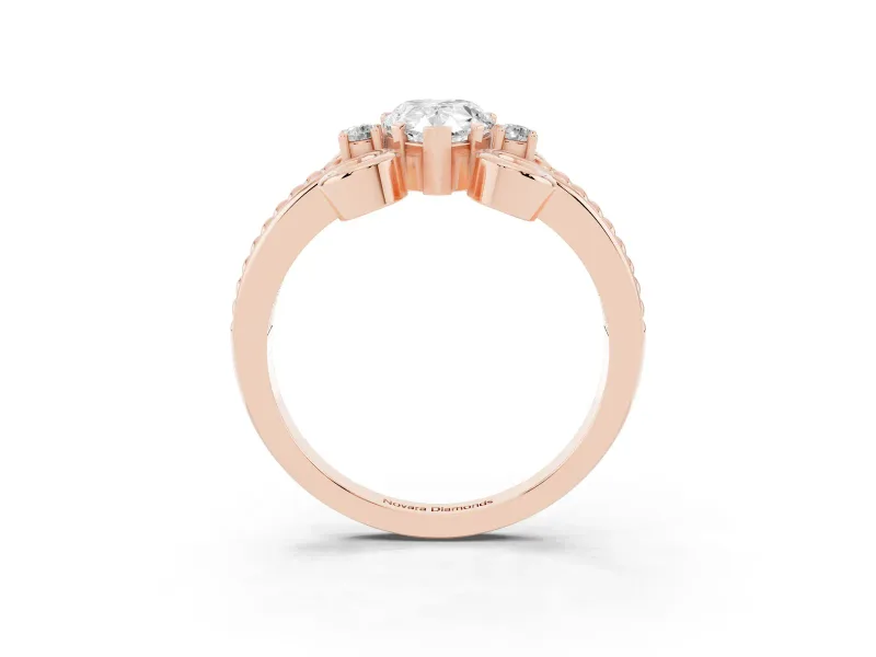 Pear Cut Diamond Twisted Band Solitaire Ring Set in Rose gold with Scroll Prongs