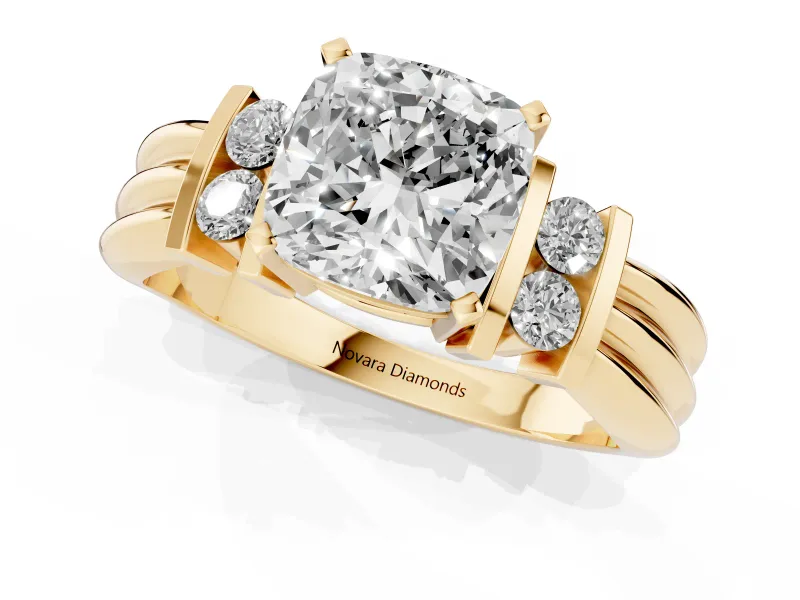 Three-Stone Cushion Cut Diamond Channel Set Ring Set in Yellow gold with Bar Prongs