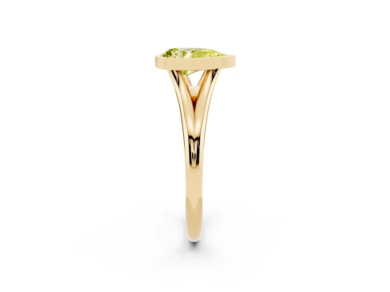 Fancy Yellow Bezel Set Pear Cut Diamond Solitaire Ring Set in Yellow gold with Tapered Band