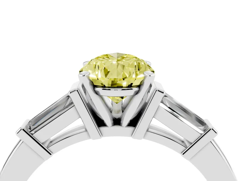 Fancy Yellow Pear Cut Diamond Solitaire Ring Set in Platinum with Tapered Baguette Accents and Prong Setting