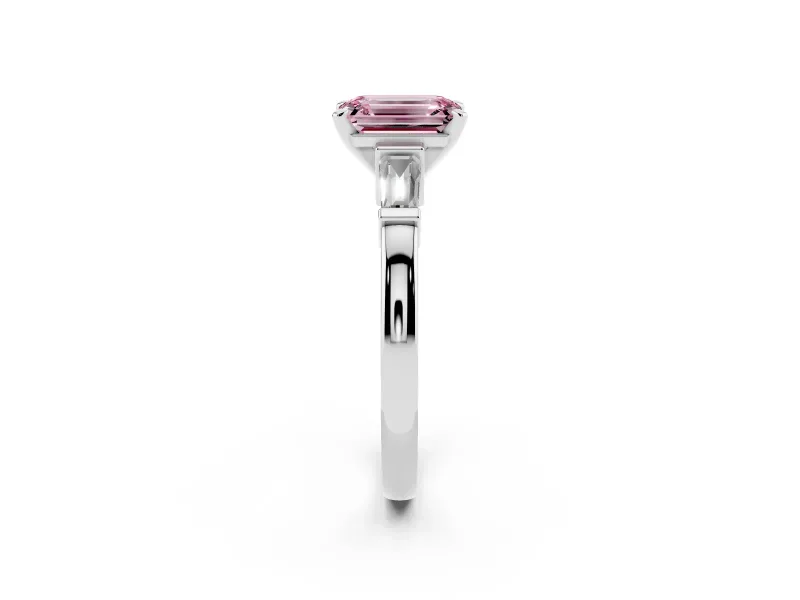 Fancy Pink Emerald Cut Diamond Solitaire Ring Set in White gold with Tapered Baguette Accents and Prong Setting