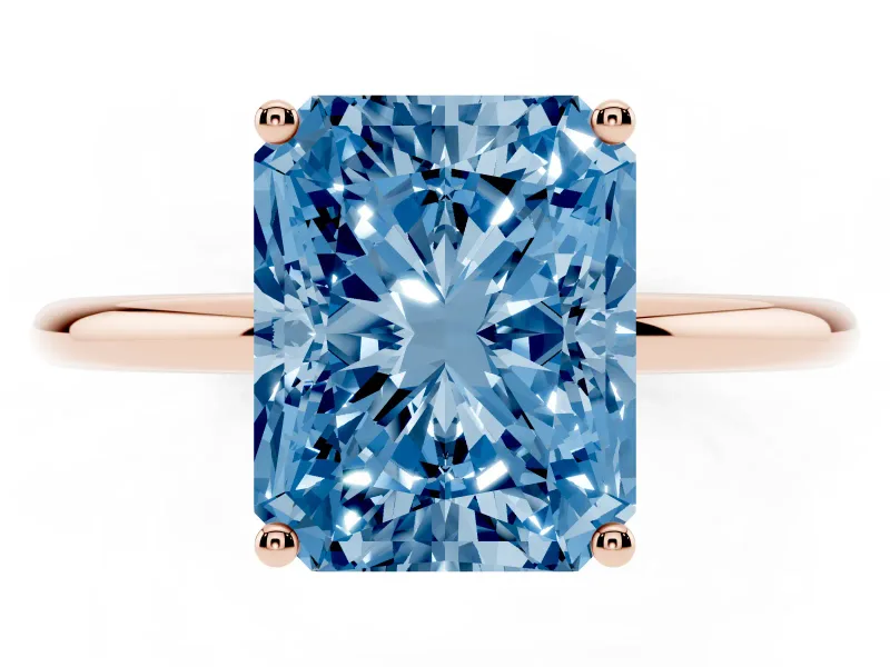 Fancy Blue Radiant Cut Diamond Solitaire Engagement Ring Set in Rose gold with Thin Band and Prong Setting