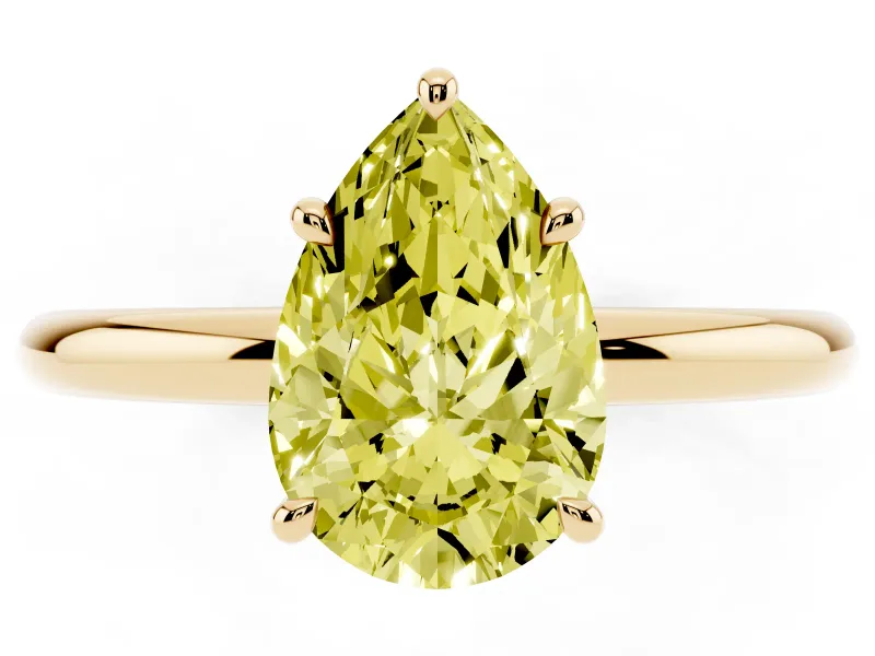 Fancy Yellow Pear Cut Diamond Solitaire Ring Set in Yellow gold with Thin Band and Prong Setting