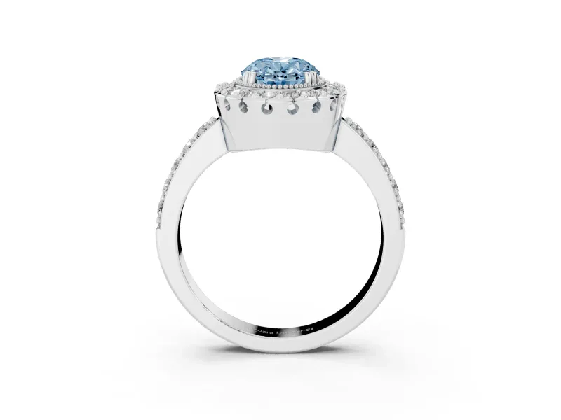 Fancy Blue Oval Cut Diamond Halo Ring Set in White gold with Pavé Shank and Prong Setting