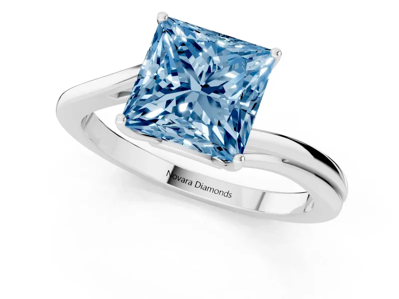 Fancy Blue Princess Cut Diamond Solitaire Twist Band Ring Set in White gold with Prong Setting