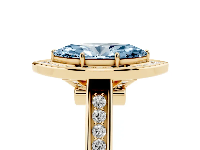 Fancy Blue Marquise Cut Diamond Halo Solitaire Ring Set in Yellow gold with Pavé Band and Bezel Setting