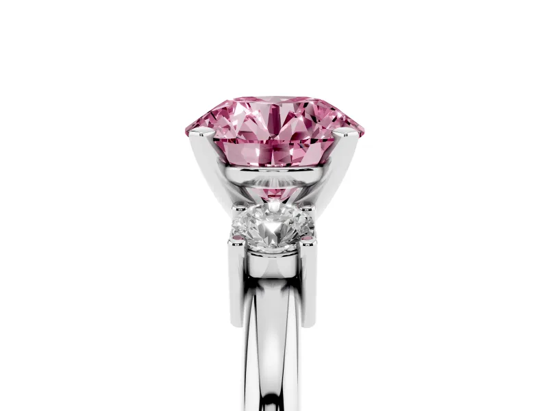 Fancy Pink Three-Stone Round Cut Diamond Ring Set in Silver with Prong Setting and Plain Band