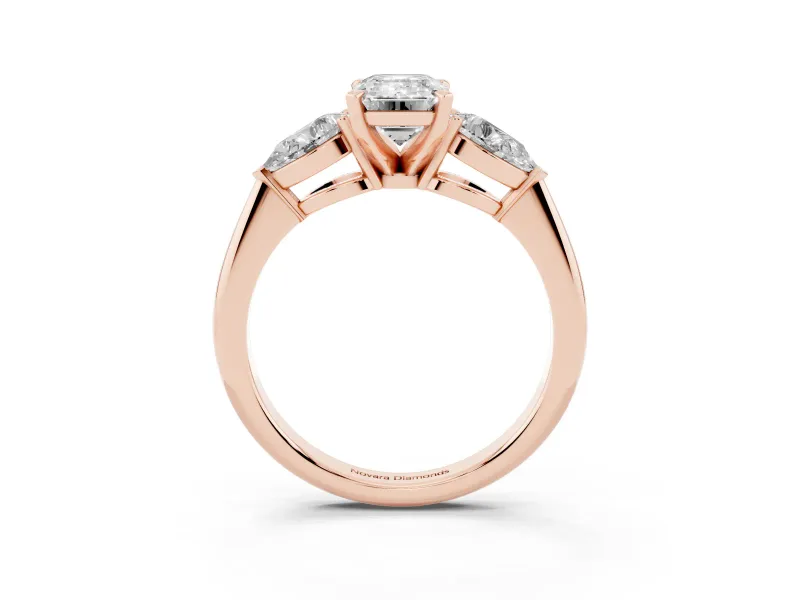Three-Stone Emerald Cut Diamond Ring Set in Rose gold with Pear Side Stones and Prong Setting