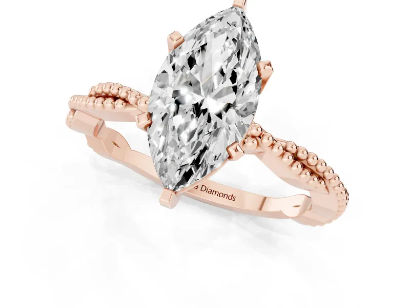 Marquise Cut Diamond Solitaire Ring Set in Rose gold with Twisted Band and Bead Prong Setting