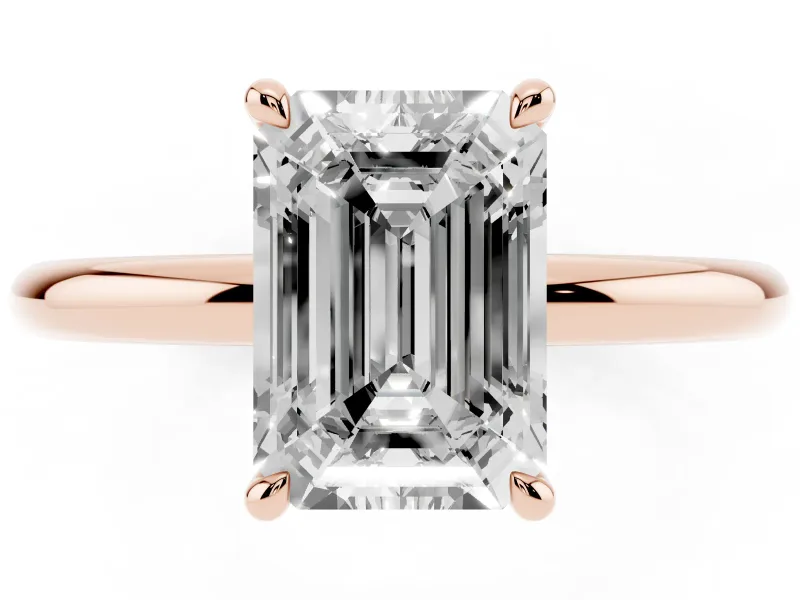 Emerald Cut Diamond Solitaire Ring Set in Rose gold with Thin Band and Prong Setting