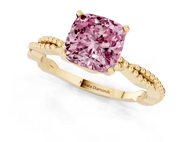 Fancy Pink Cushion Cut Diamond Solitaire Ring Set in Yellow gold with Twisted Band and Bead Prong Setting