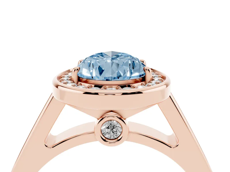 Fancy Blue Pear Cut Diamond Halo Solitaire Ring Set in Rose gold with Pavé Band and Bezel Setting