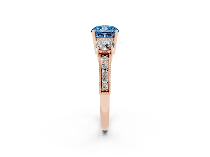 Fancy Blue Cushion Cut Diamond Three-Stone Ring Set in Rose gold with Round Side Stones and Pavé Band